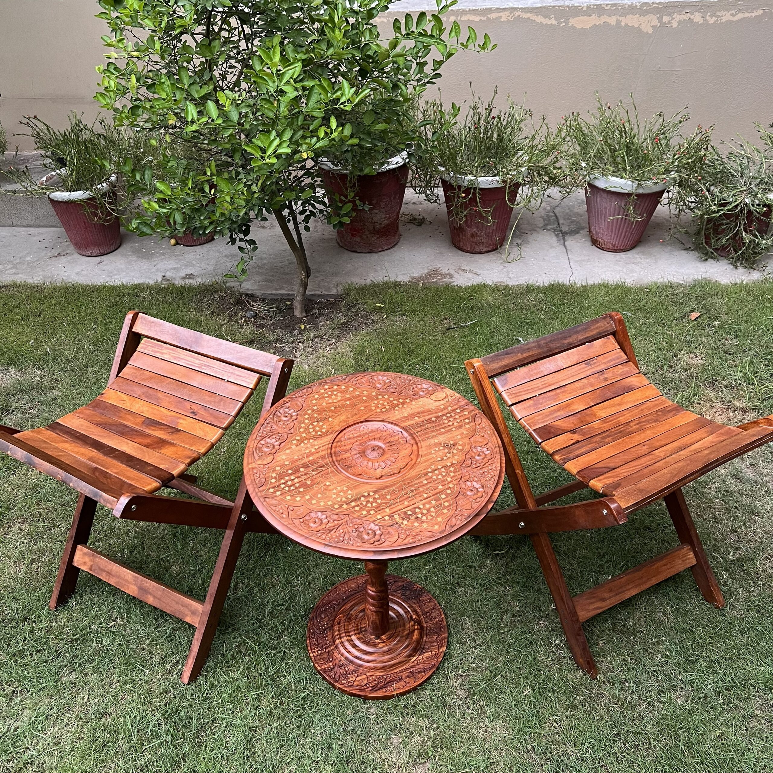 Finished handcrafted Auris Atelier wooden table in a warm living room